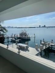 view of dock with a water view