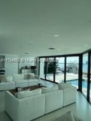 unfurnished living room featuring expansive windows