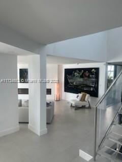 interior space featuring baseboards