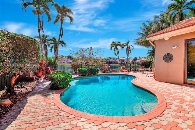 view of pool featuring a patio