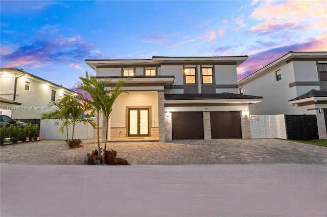 view of front of property with a garage