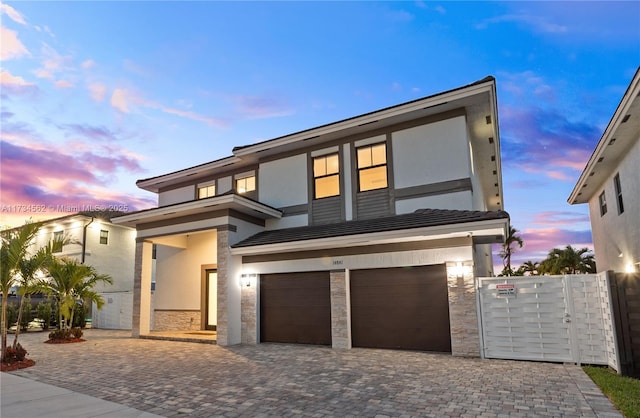 view of front of property featuring a garage