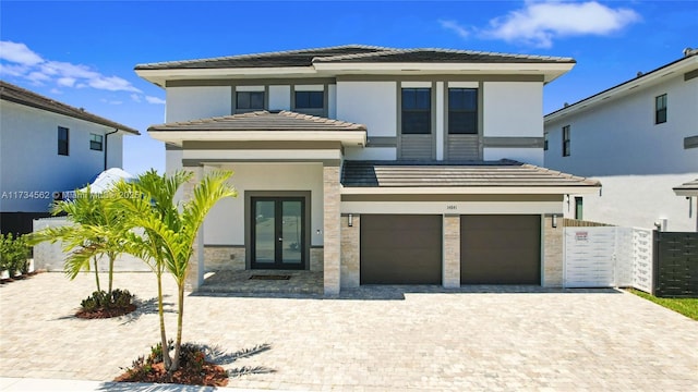 view of front of property with a garage