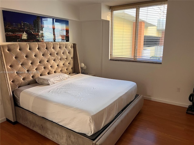 bedroom featuring wood-type flooring