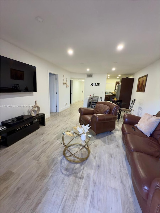 living room featuring light wood-type flooring