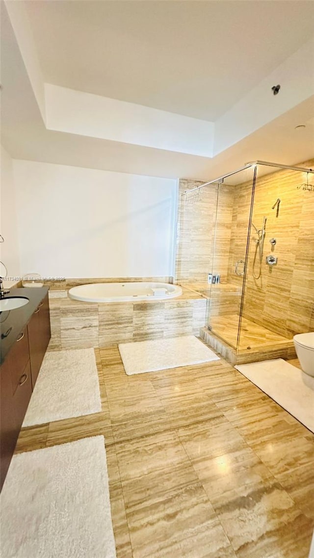 bathroom with toilet and walk in shower