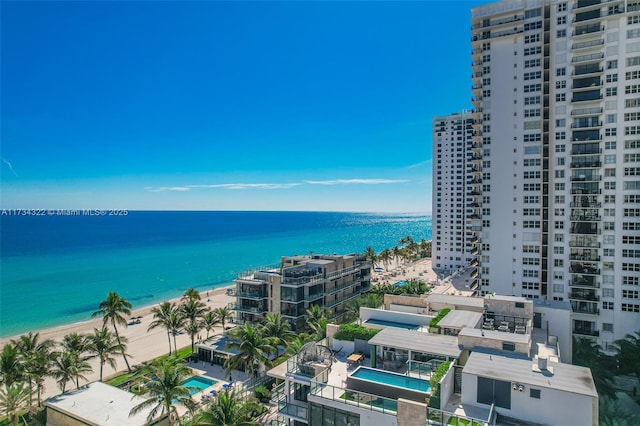 aerial view featuring a water view and a view of the beach