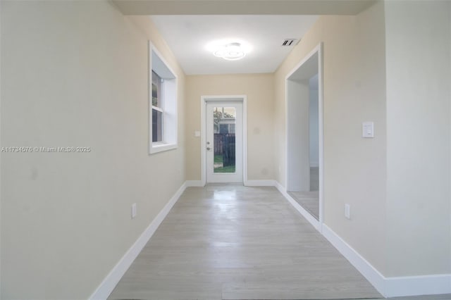 hallway featuring light hardwood / wood-style floors