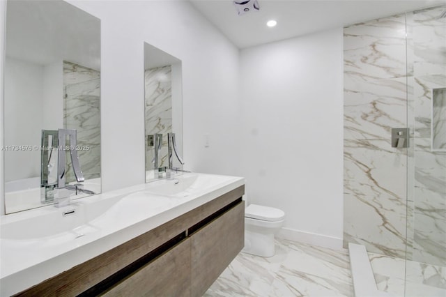 bathroom with vanity, toilet, and walk in shower