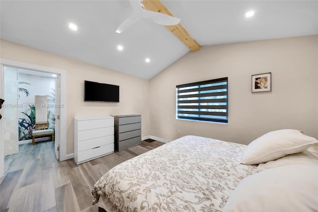 bedroom with lofted ceiling with beams and light hardwood / wood-style flooring