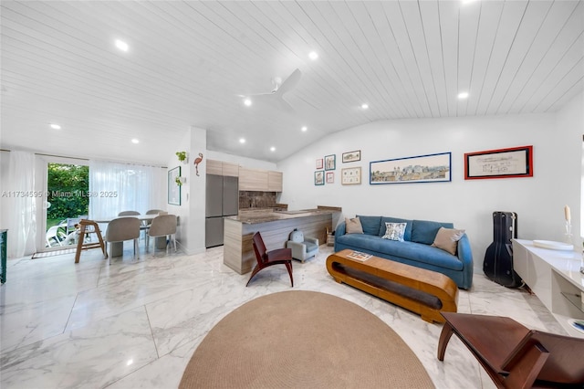 living room featuring lofted ceiling, wood ceiling, and ceiling fan