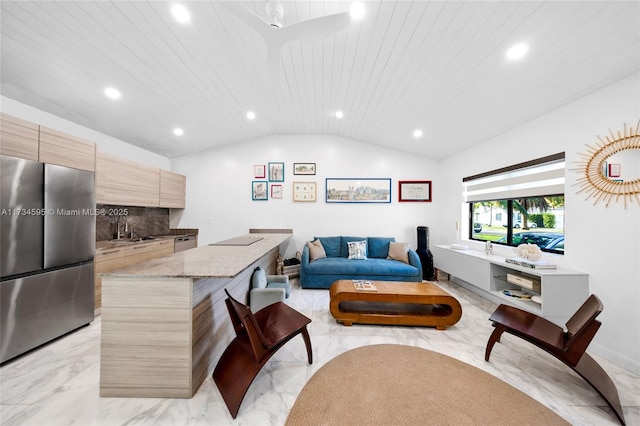 living room featuring wood ceiling, sink, and vaulted ceiling