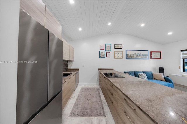 kitchen with lofted ceiling, appliances with stainless steel finishes, light stone countertops, wooden ceiling, and light brown cabinets