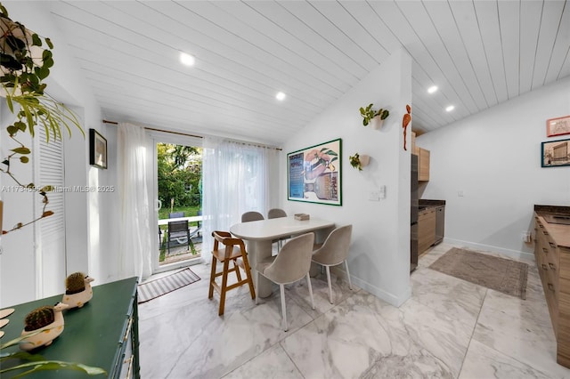 dining space featuring lofted ceiling and wooden ceiling