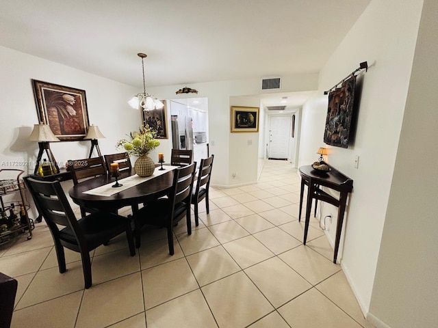 dining room with light tile patterned floors