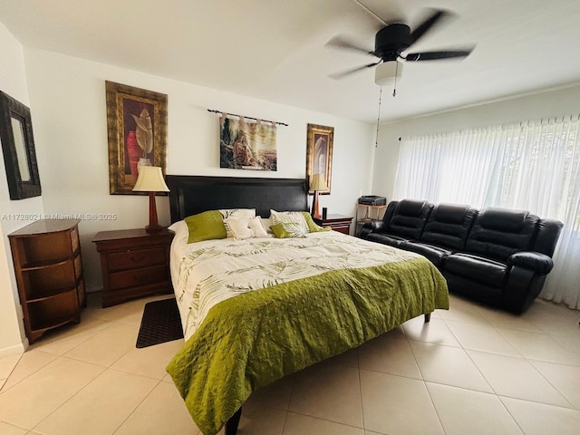 bedroom featuring light tile patterned flooring and ceiling fan