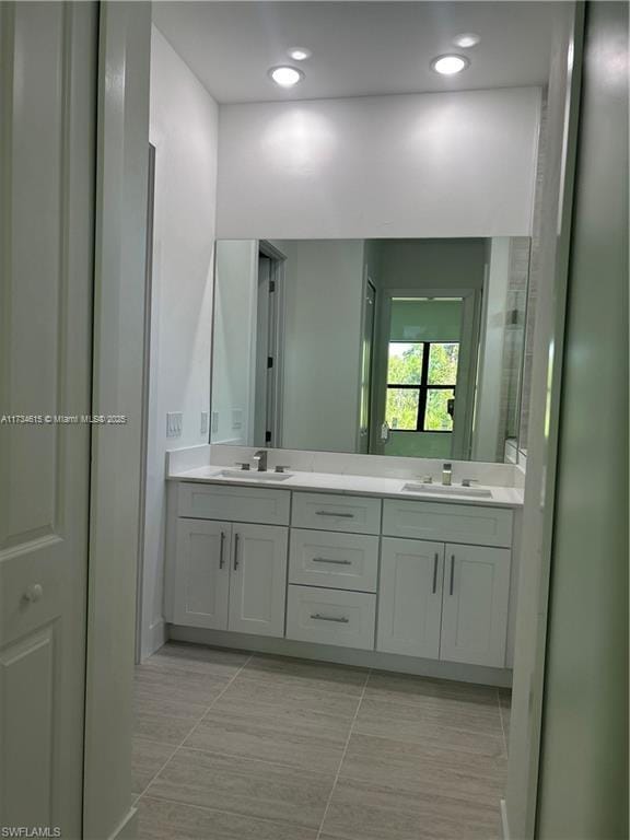 bathroom featuring vanity and tile patterned floors