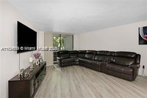 living room with light wood-type flooring