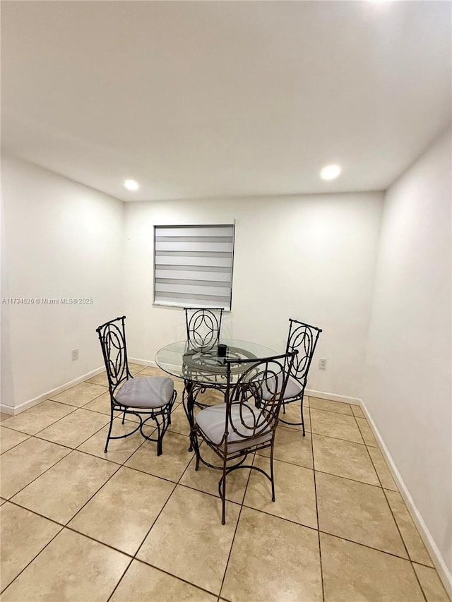 dining room with light tile patterned floors