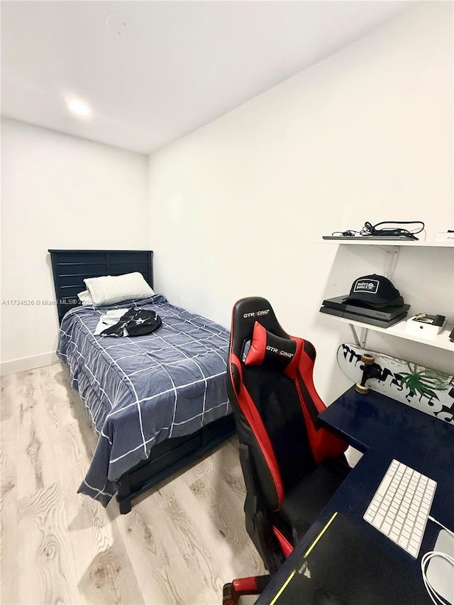 bedroom featuring hardwood / wood-style flooring