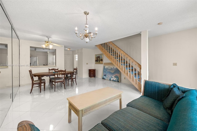 10836 Cypress Glen Dr, Coral Springs, FL 33071 - tiled living room featuring ceiling fan with notable chandelier and a textured ceiling