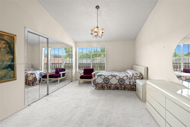 10836 Cypress Glen Dr, Coral Springs, FL 33071 - carpeted bedroom featuring an inviting chandelier, a textured ceiling, and a closet