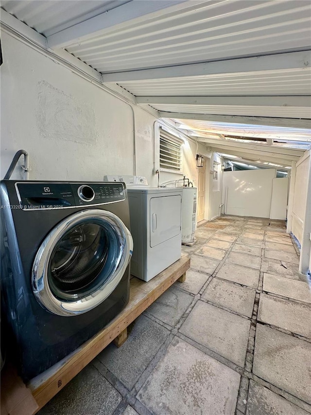 laundry area with separate washer and dryer