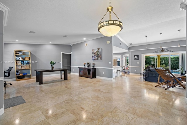 interior space with crown molding and a textured ceiling