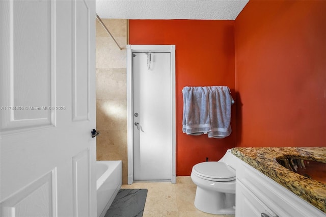 full bathroom with vanity, shower / bathing tub combination, a textured ceiling, and toilet