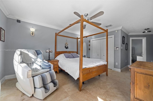 bedroom with ornamental molding, ceiling fan, and a closet