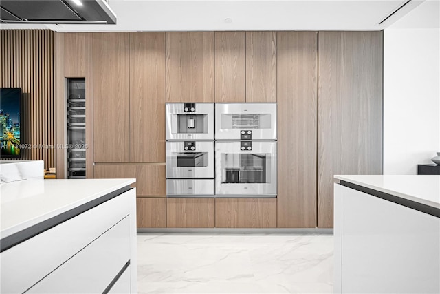 kitchen with stainless steel double oven