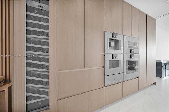 kitchen featuring light brown cabinetry