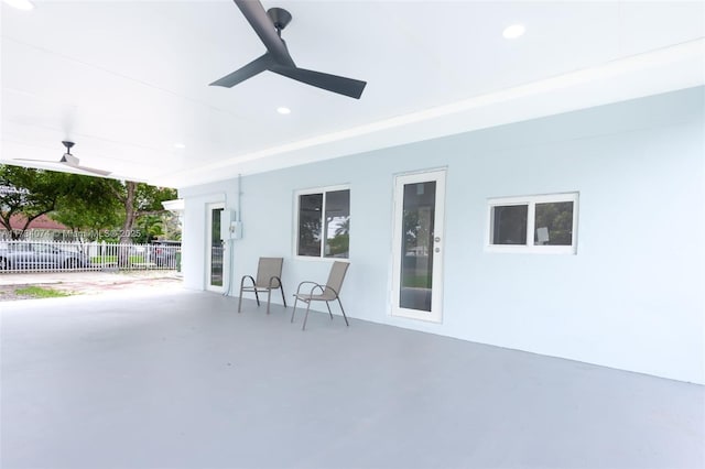 view of patio featuring ceiling fan