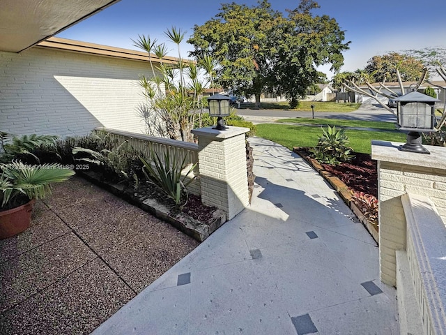 view of home's exterior featuring a lawn