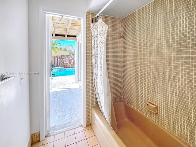 entryway with light tile patterned floors