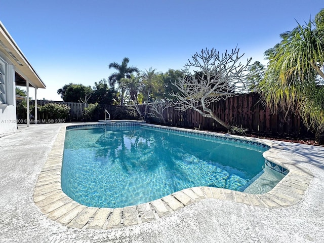 view of pool with a patio area