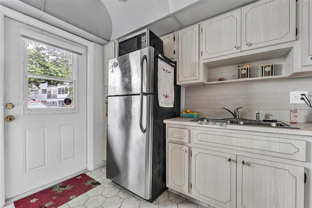 kitchen featuring stainless steel appliances and sink