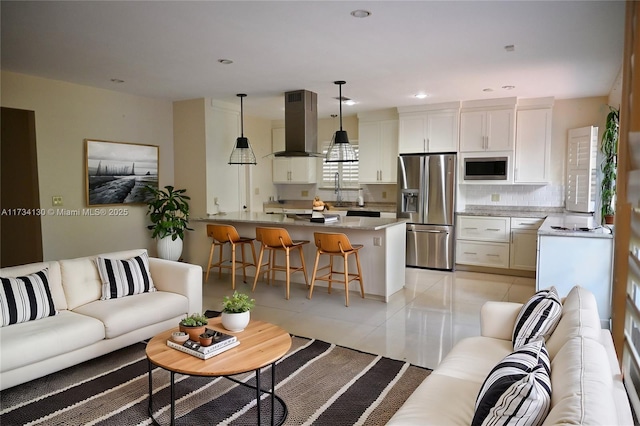 living room with light tile patterned floors