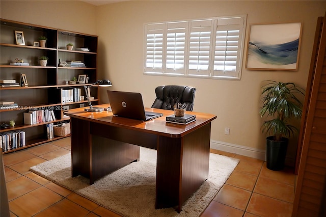 home office with light tile patterned flooring