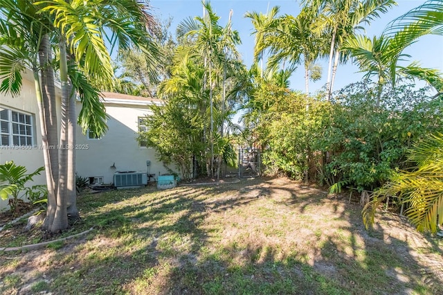 view of yard with central AC