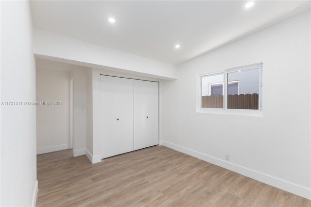 interior space featuring vanity, beam ceiling, and an enclosed shower