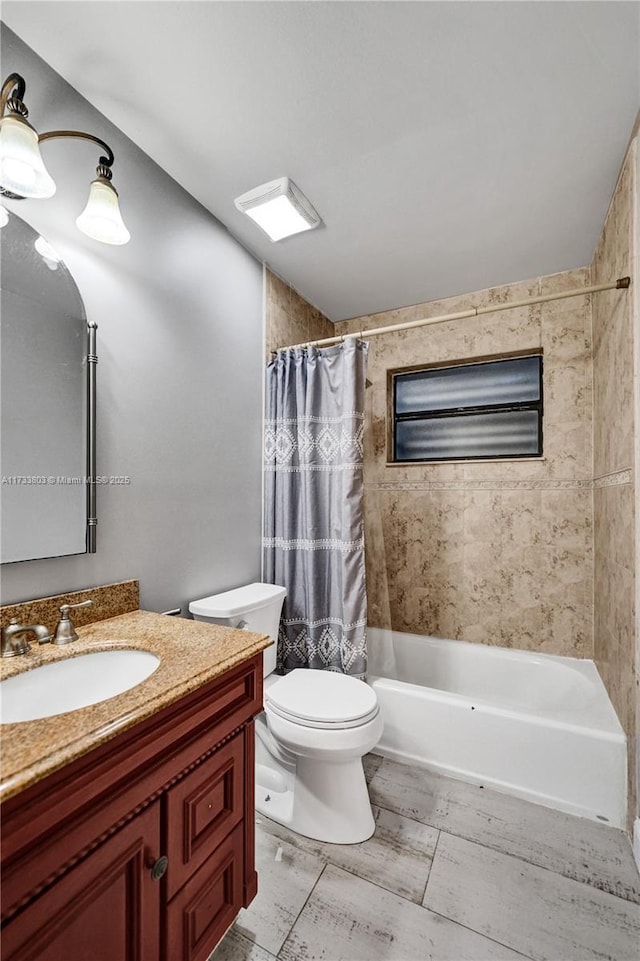 full bathroom featuring vanity, toilet, and shower / bathtub combination with curtain