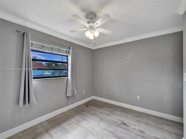 empty room with crown molding, ceiling fan, and light hardwood / wood-style flooring