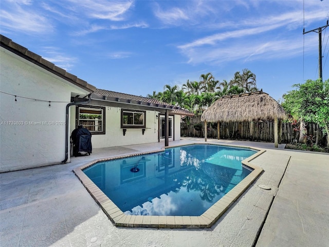 view of pool with a gazebo and a patio area