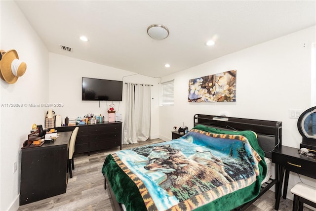 bedroom featuring light wood-type flooring