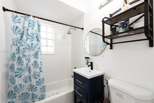 full bathroom featuring vanity, shower / tub combo with curtain, and toilet