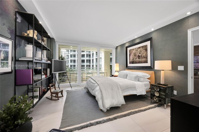 3400 SW 27th Ave Unit 704, Miami, FL 33133 - bedroom with recessed lighting and expansive windows