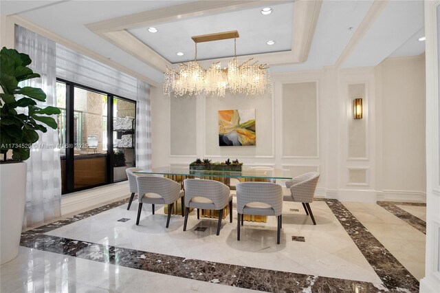 3400 SW 27th Ave Unit 704, Miami, FL 33133 - dining room featuring inlaid floor details, a chandelier, marble tiled floors, recessed lighting, and a decorative wall