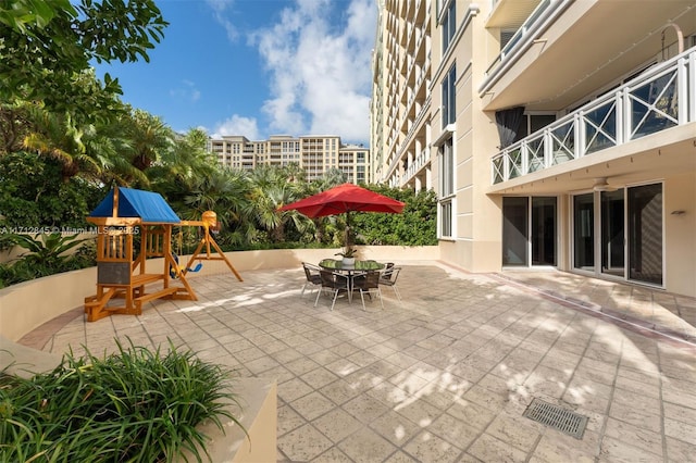 view of patio with a playground