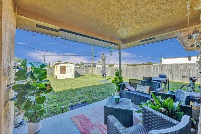 view of patio / terrace featuring an outdoor hangout area and a storage shed